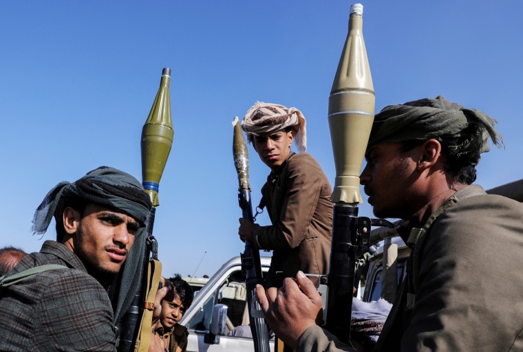 Houthi tribesmen gather to show defiance after U.S. and U.K air strikes on Houthi positions near Sanaa