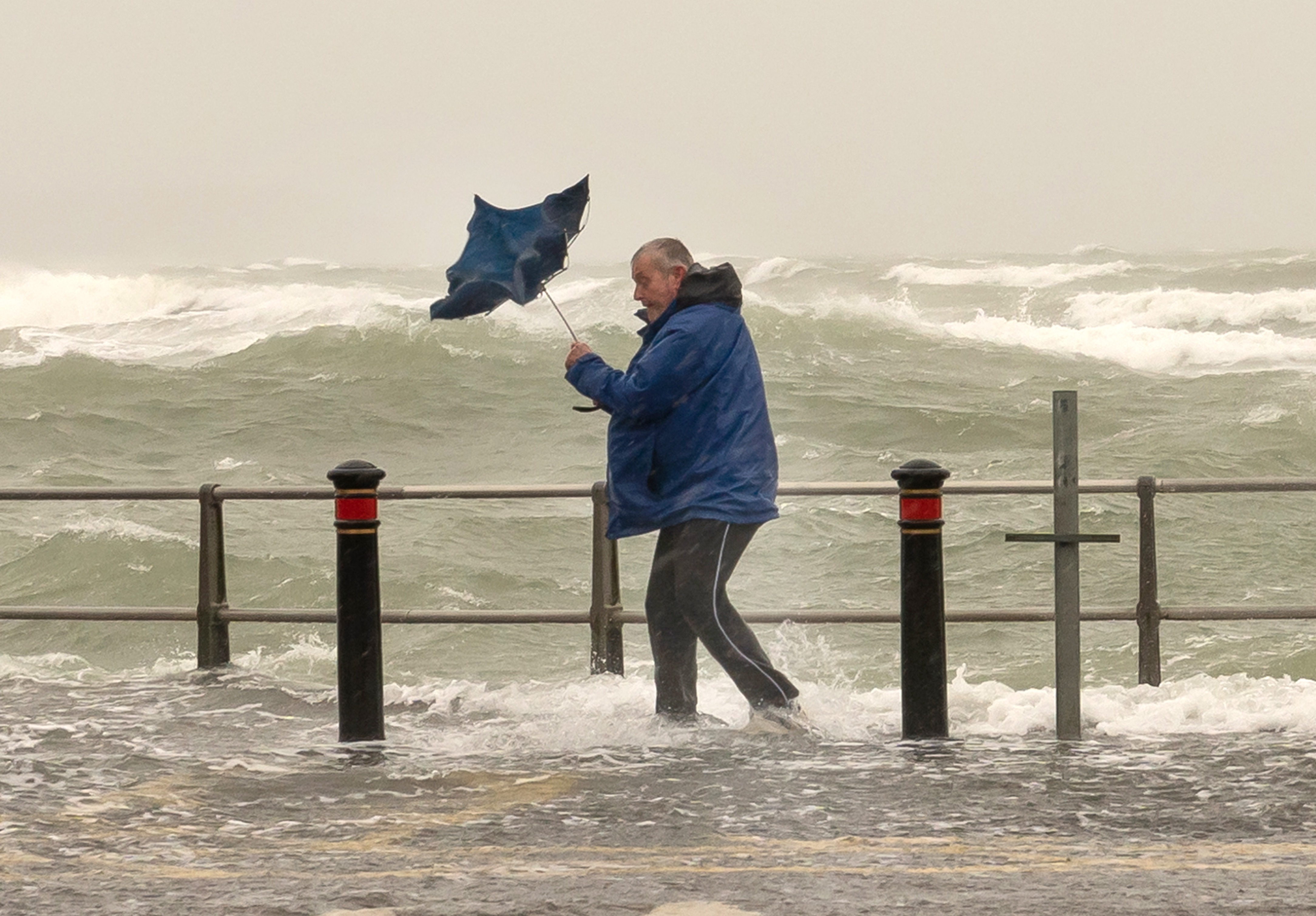 The Met Office has warned of injuries and danger to life from 'large waves and beach material being thrown on to sea fronts, coastal roads and properties'