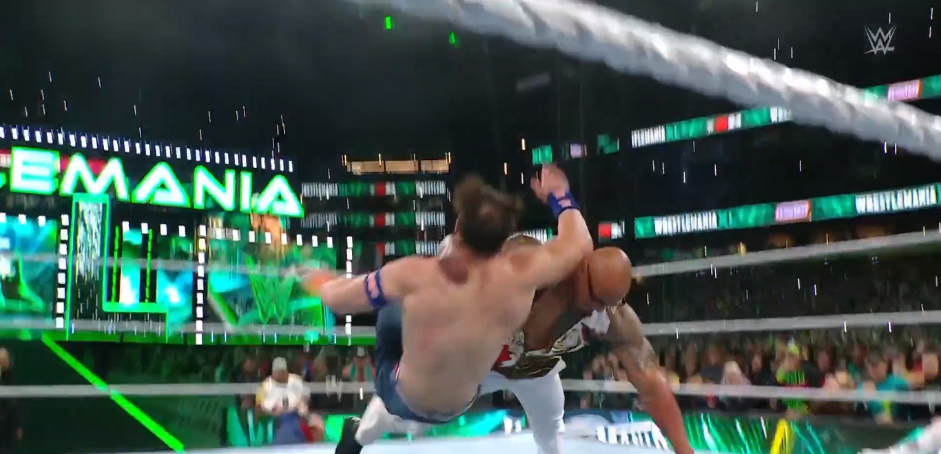 The Rock floored Cena with a vicious Rock Bottom